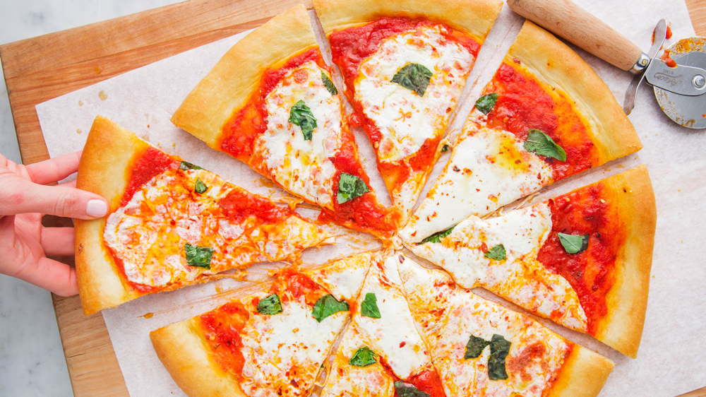 How to Make Delicious Homemade Pizza From Scratch Tips for rolling out the pizza dough
